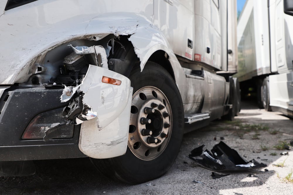 Closeup of a white wrecked truck