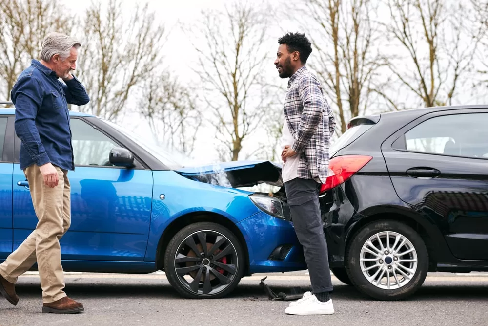 Rear-End car crash of a blue and black car