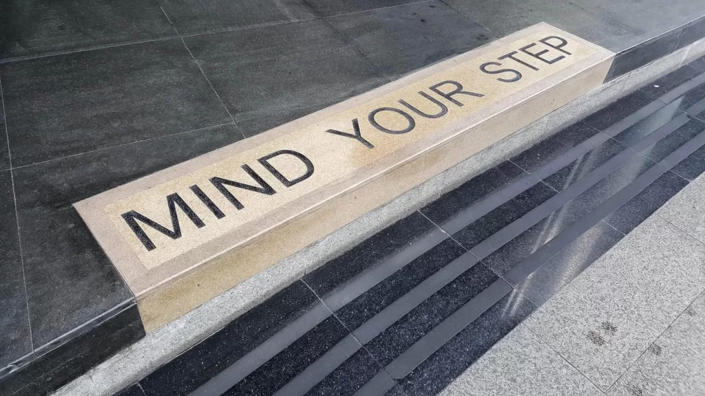 Mind your step word on the floor